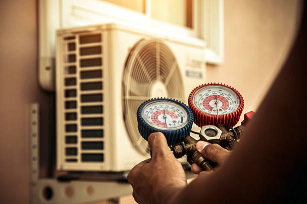Professional Air Conditioning Service technician working in Hatchechubbee, AL